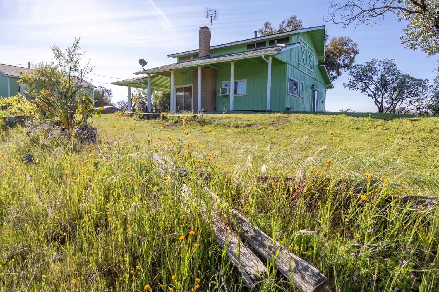 34107 Memory Lane Coarsegold, CA 93614 - Photo 34 of 46 a view of a house with a yard