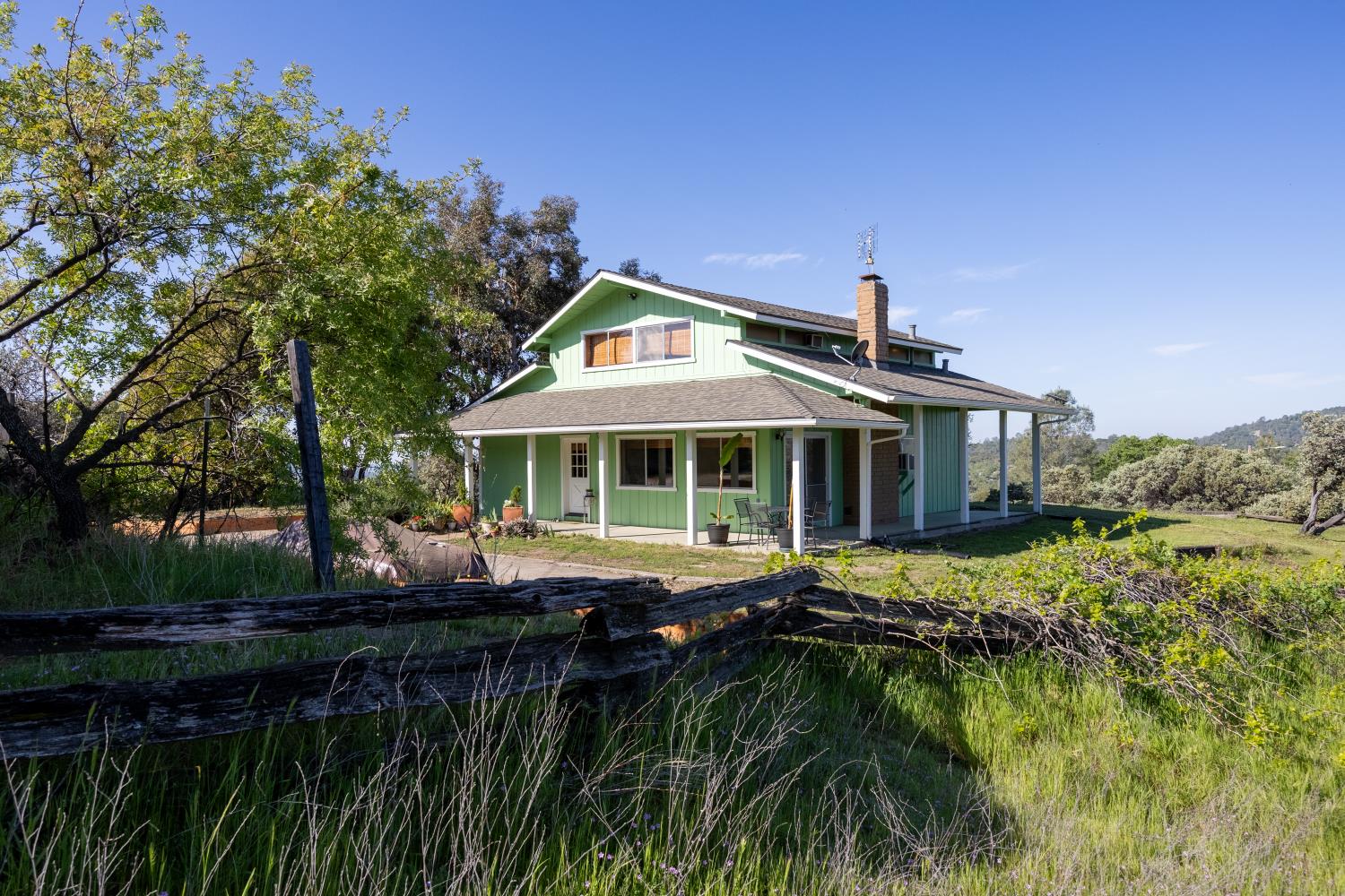 34107 Memory Lane Coarsegold, CA 93614 - Photo 37 of 46 a front view of a house with a yard