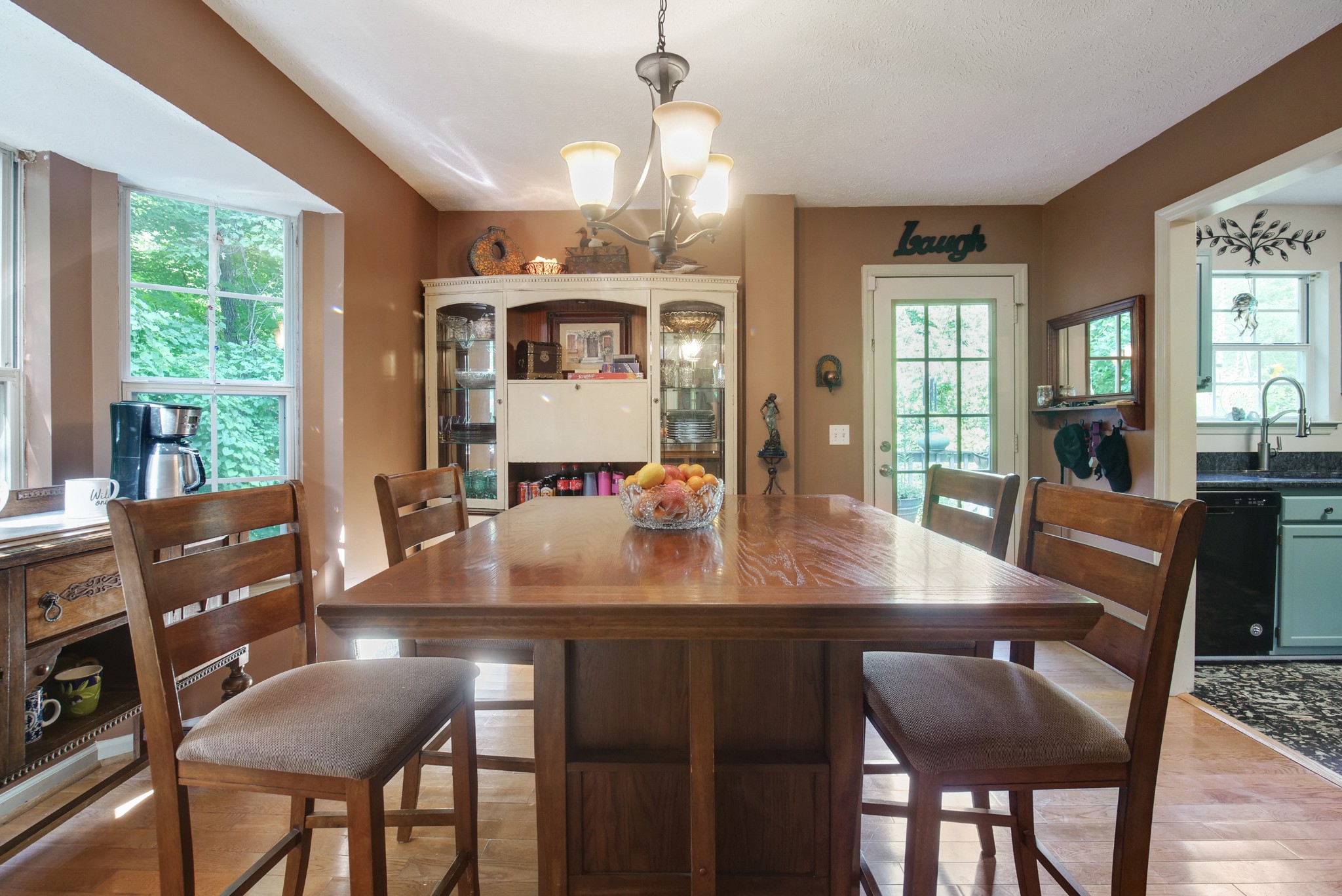 137 Gaskins Road Dickson, TN 37055 - Photo 11 of 38 a dining room with furniture a chandelier and wooden floor