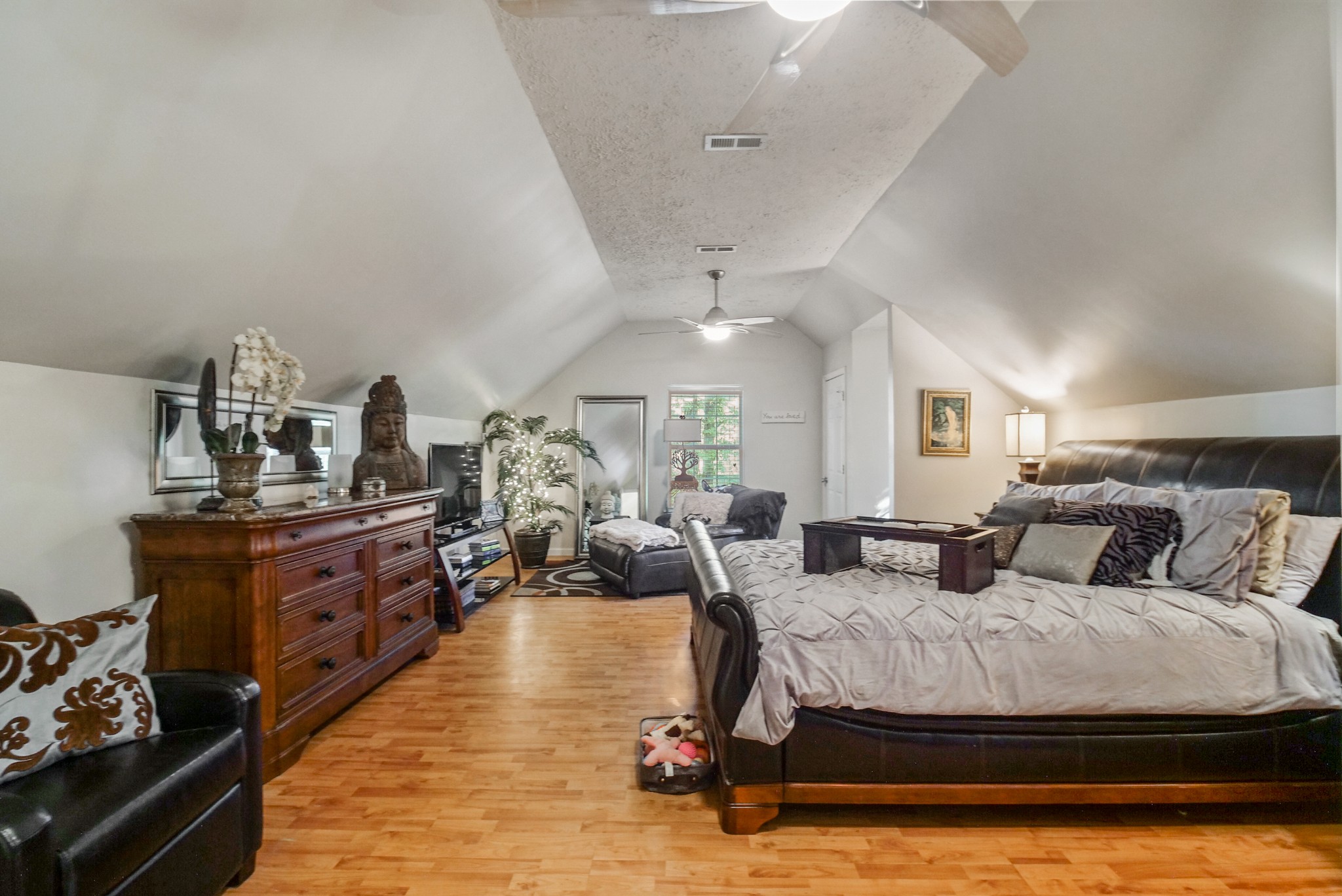 137 Gaskins Road Dickson, TN 37055 - Photo 24 of 38 a living room with furniture and a fireplace