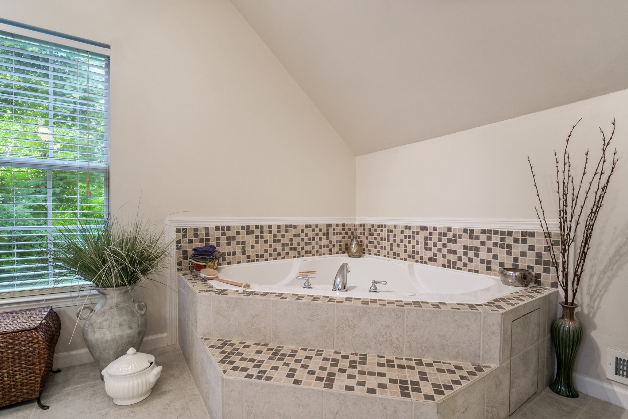 137 Gaskins Road Dickson, TN 37055 - Photo 29 of 38 a bath tub sitting in a bathroom next to a window