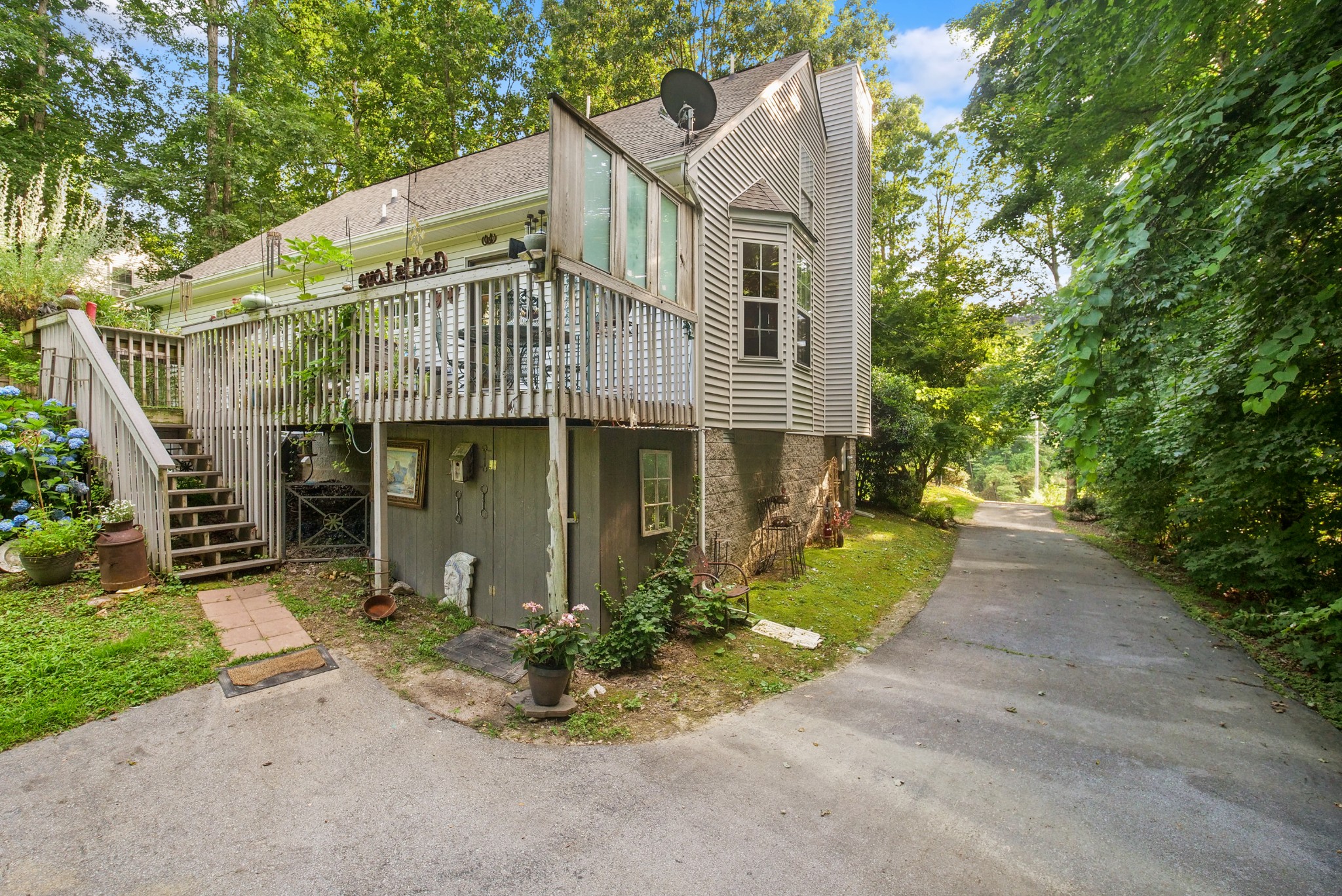 137 Gaskins Road Dickson, TN 37055 - Photo 36 of 38 a front view of a house with garden