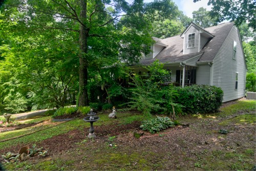 137 Gaskins Road Dickson, TN 37055 - Photo 37 of 38 a front view of a house with garden