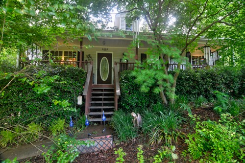 137 Gaskins Road Dickson, TN 37055 - Photo 38 of 38 a view of a house with a yard and plants