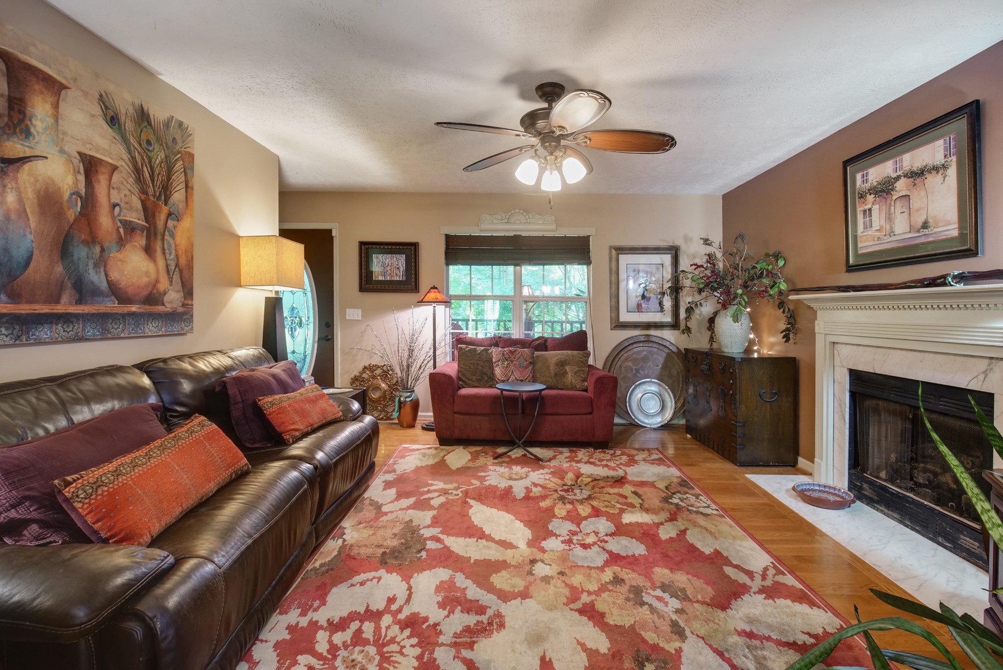 137 Gaskins Road Dickson, TN 37055 - Photo 7 of 38 a living room with furniture and a fireplace