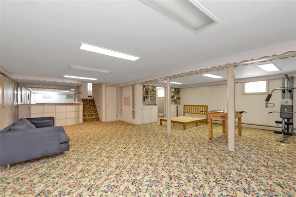 a living room with furniture and a table