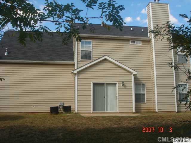 9328 Culcairn Road Huntersville, NC 28078 - Photo 8 of 8 a front view of a house with a garden