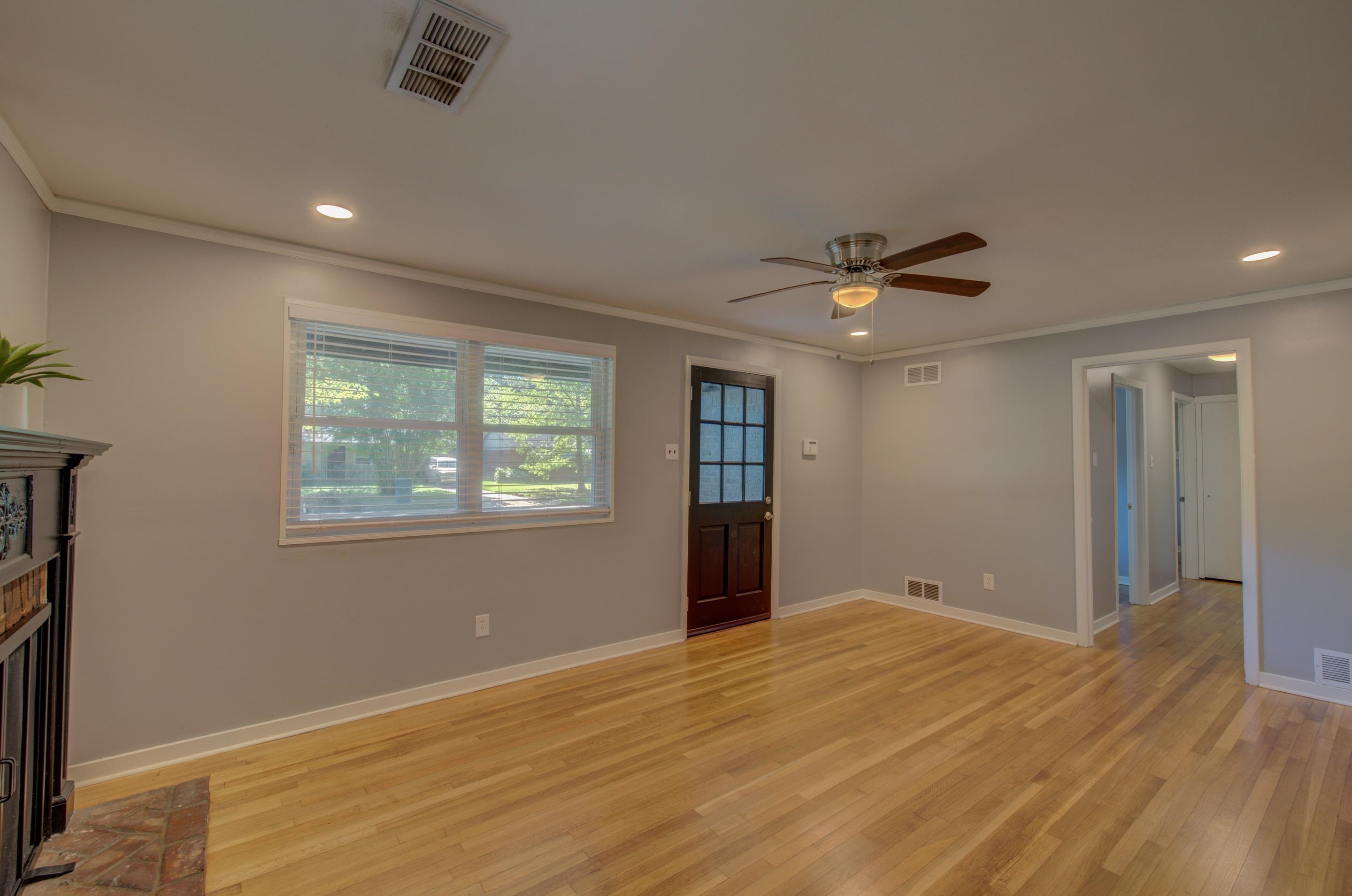 1059 Wellsville Road Memphis, TN 38117 - Photo 4 of 20 a view of an empty room with a window