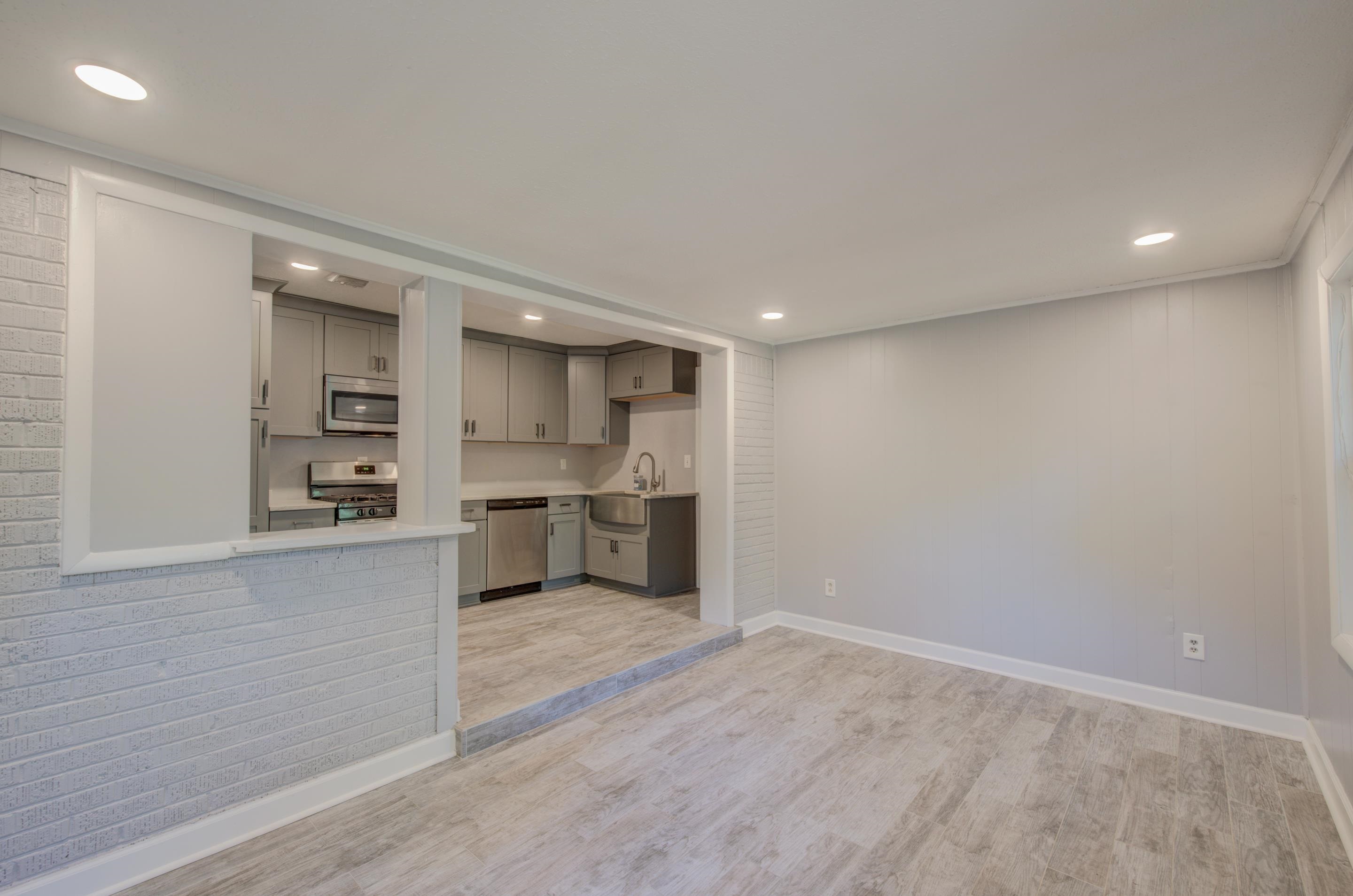 1059 Wellsville Road Memphis, TN 38117 - Photo 8 of 20 a view of kitchen with wooden floor