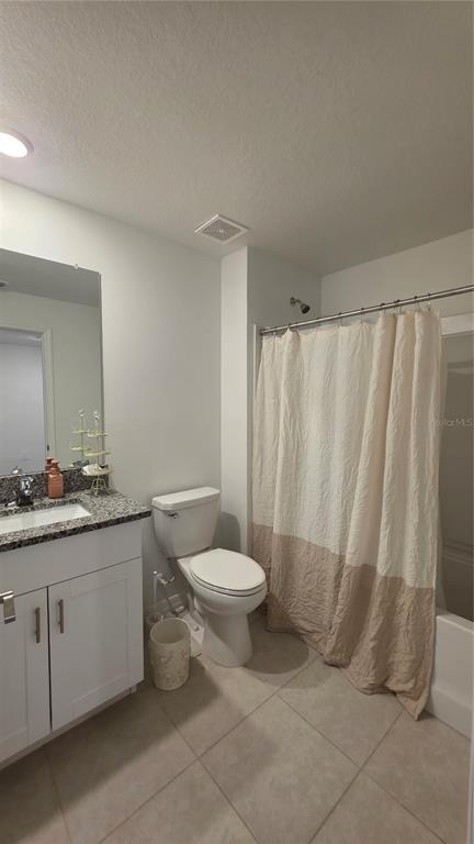 36352 Wl Hl Way Zephyrhills, FL 33541 - Photo 13 of 32 a bathroom with a granite countertop sink a toilet and a mirror