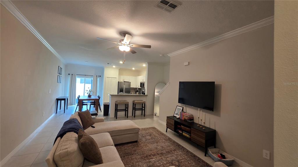 36352 Wl Hl Way Zephyrhills, FL 33541 - Photo 2 of 32 a living room with furniture and a flat screen tv