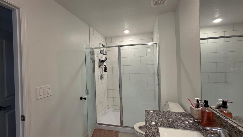 36352 Wl Hl Way Zephyrhills, FL 33541 - Photo 21 of 32 a bathroom with a shower