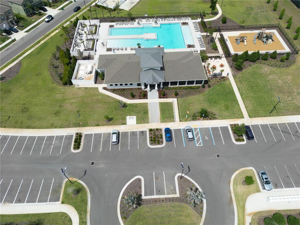 36352 Wl Hl Way Zephyrhills, FL 33541 - Photo 31 of 32 an aerial view of a house with outdoor space and sitting area