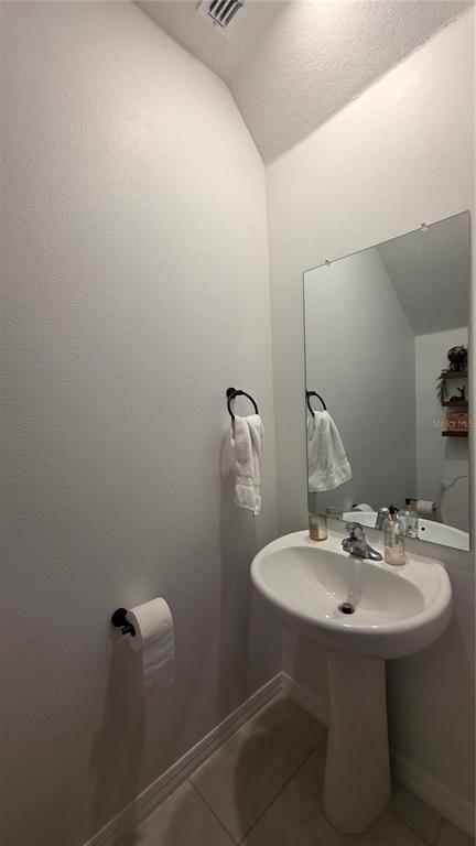 36352 Wl Hl Way Zephyrhills, FL 33541 - Photo 7 of 32 a bathroom with a sink and mirror