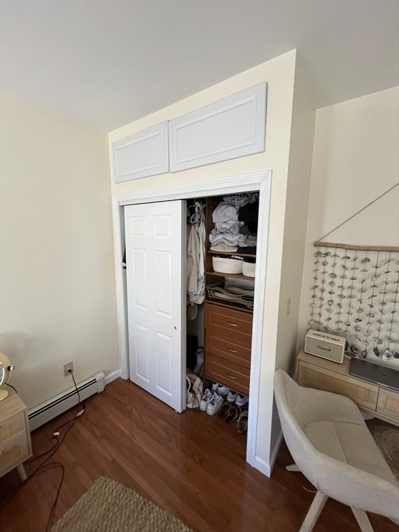 39 O Street, Unit 1 Boston, MA 02127 - Photo 15 of 26 a view of livingroom with furniture and wooden floor