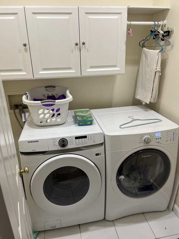 39 O Street, Unit 1 Boston, MA 02127 - Photo 25 of 26 a utility room with dryer and washer