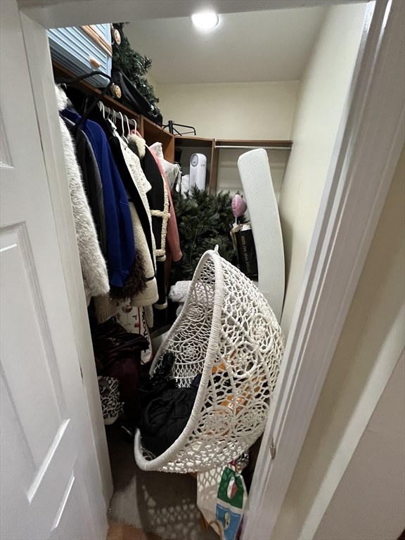 39 O Street, Unit 1 Boston, MA 02127 - Photo 7 of 26 a view of water heater room with furniture
