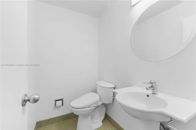 an empty room with a bench