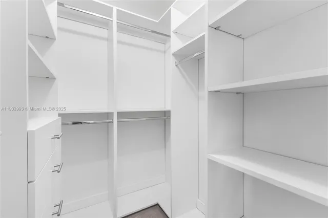 a view of swimming pool with outdoor seating and plants