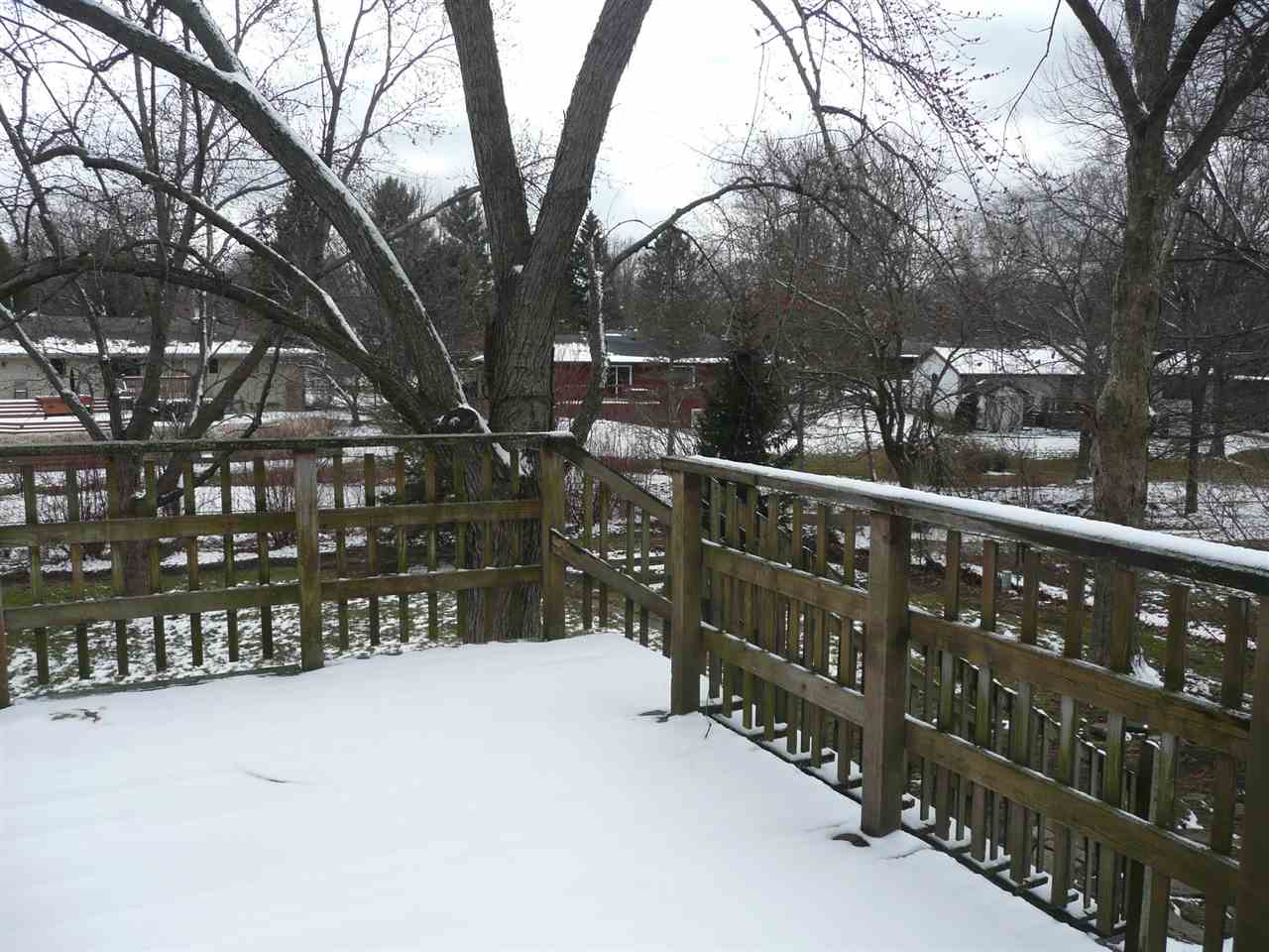 5343 Brookview Road Rockford, IL 61107 - Photo 22 of 22 a view of a street with a wooden fence