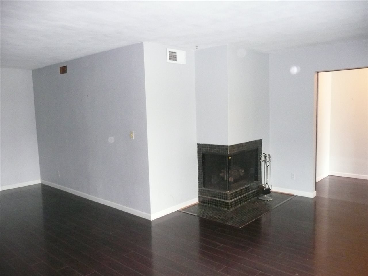 5343 Brookview Road Rockford, IL 61107 - Photo 4 of 22 a room with wooden floor and window