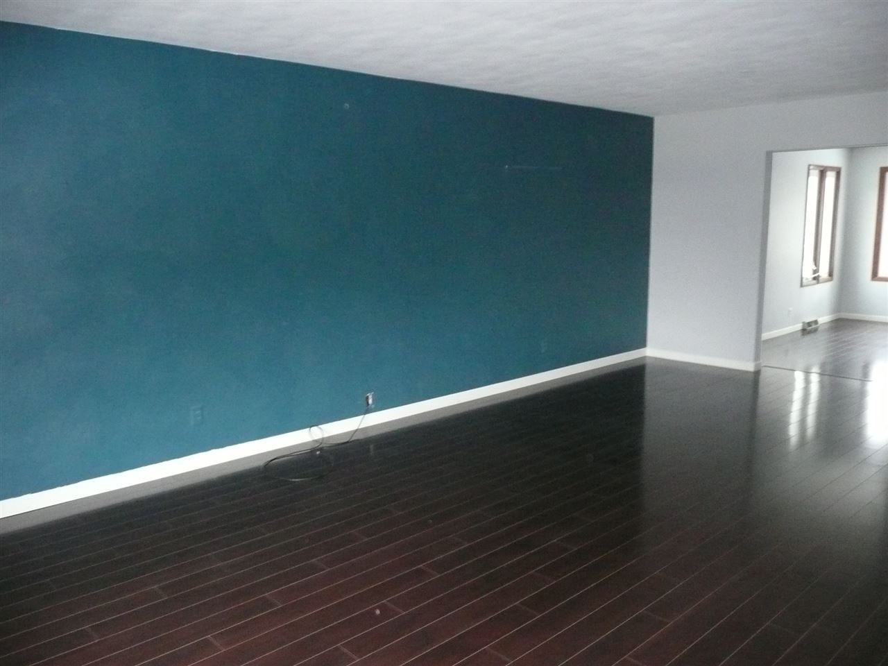 5343 Brookview Road Rockford, IL 61107 - Photo 5 of 22 a view of a room with wooden floor