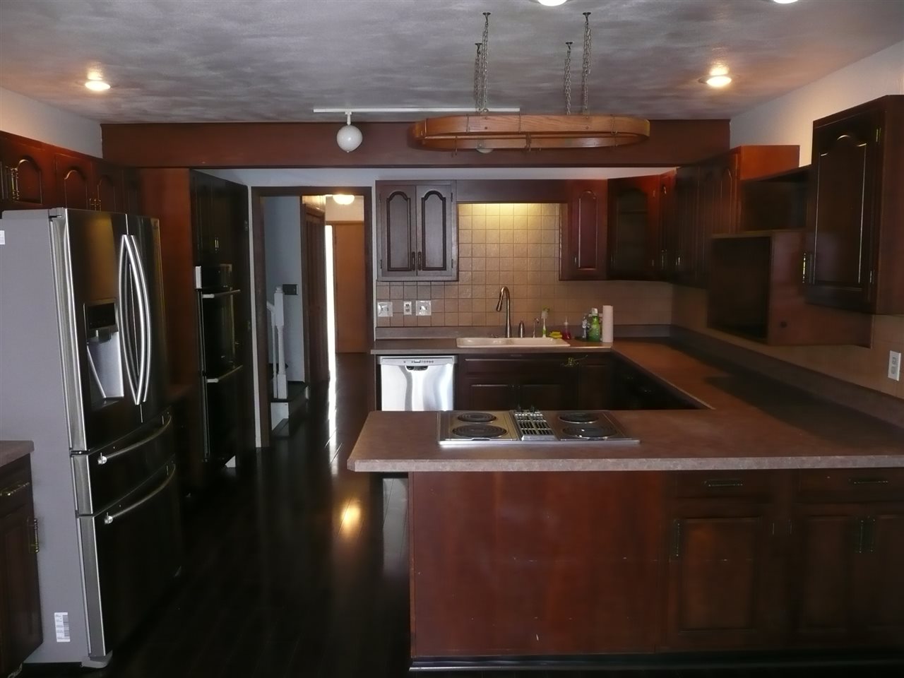 5343 Brookview Road Rockford, IL 61107 - Photo 10 of 22 a kitchen with stainless steel appliances a refrigerator sink and stove