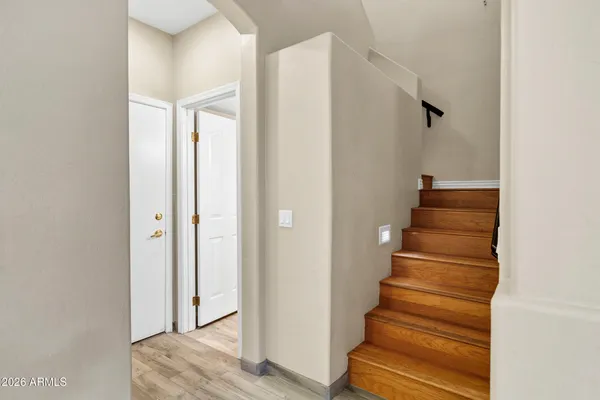 a view of entryway with wooden floor