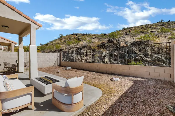 a view of balcony with furniture