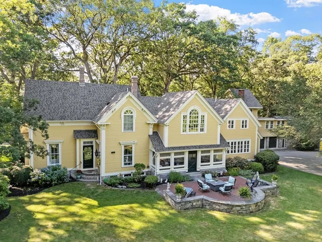 a view of a trees and basketball court