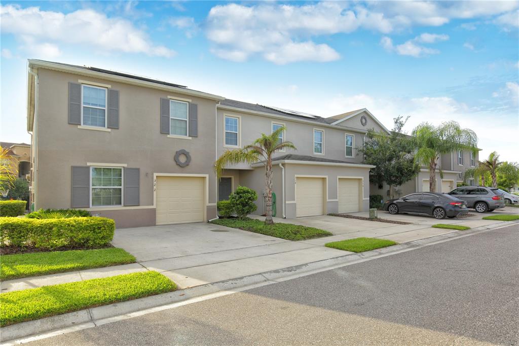 318 Highcrest Road Davenport, FL 33896 - Photo 1 of 1 Front view of 318 Highcrest Road - 2nd from the left.