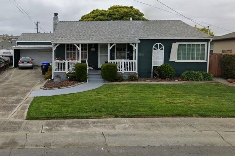 a view of a house with a garden