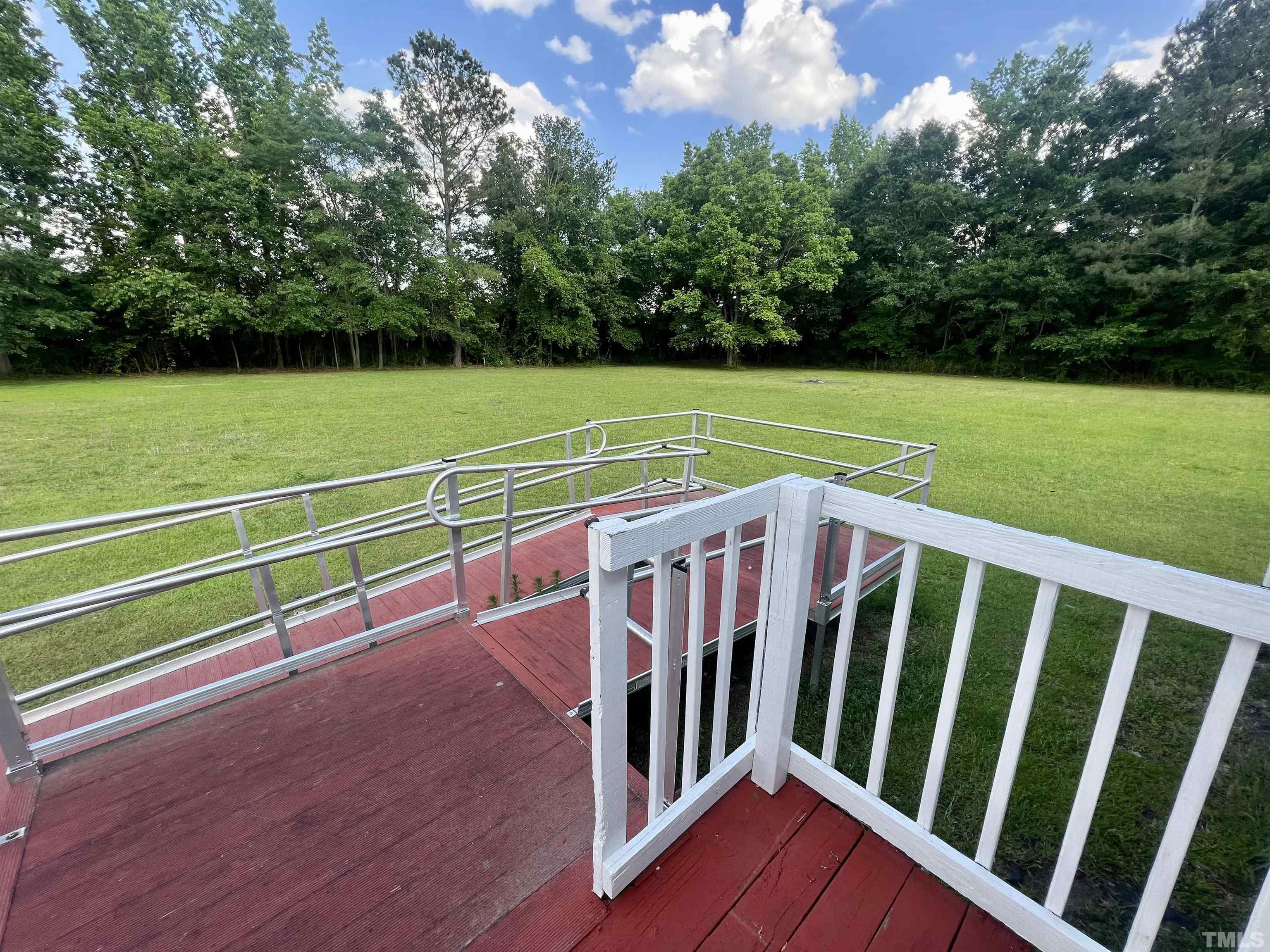 4271 Bryant Pond Road, Unit G Dunn, NC 28334 - Photo 23 of 32 a view of a tennis court