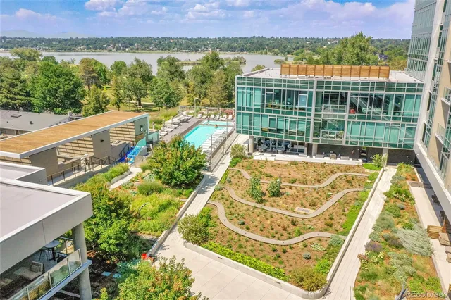 a view of swimming pool with an outdoor seating