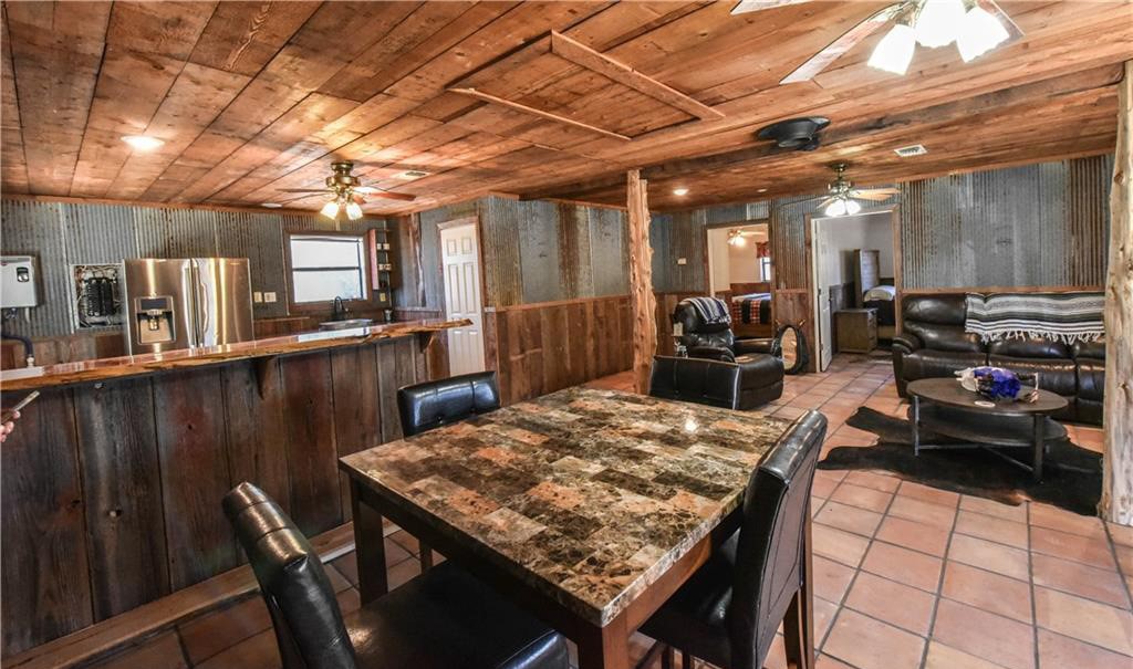 12200 Winn Road Franklin, TX 77856 - Photo 6 of 33 a view of a dining area with furniture