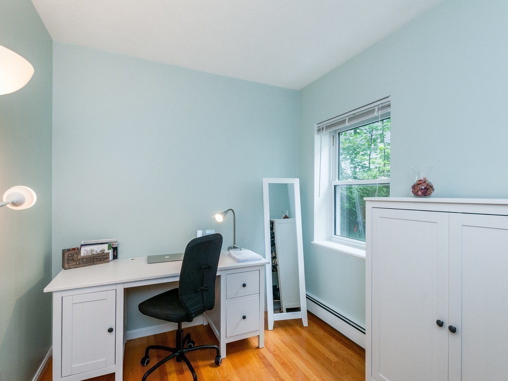 12 Regent Street Cambridge, MA 02140 - Photo 12 of 18 a workspace with furniture and a window