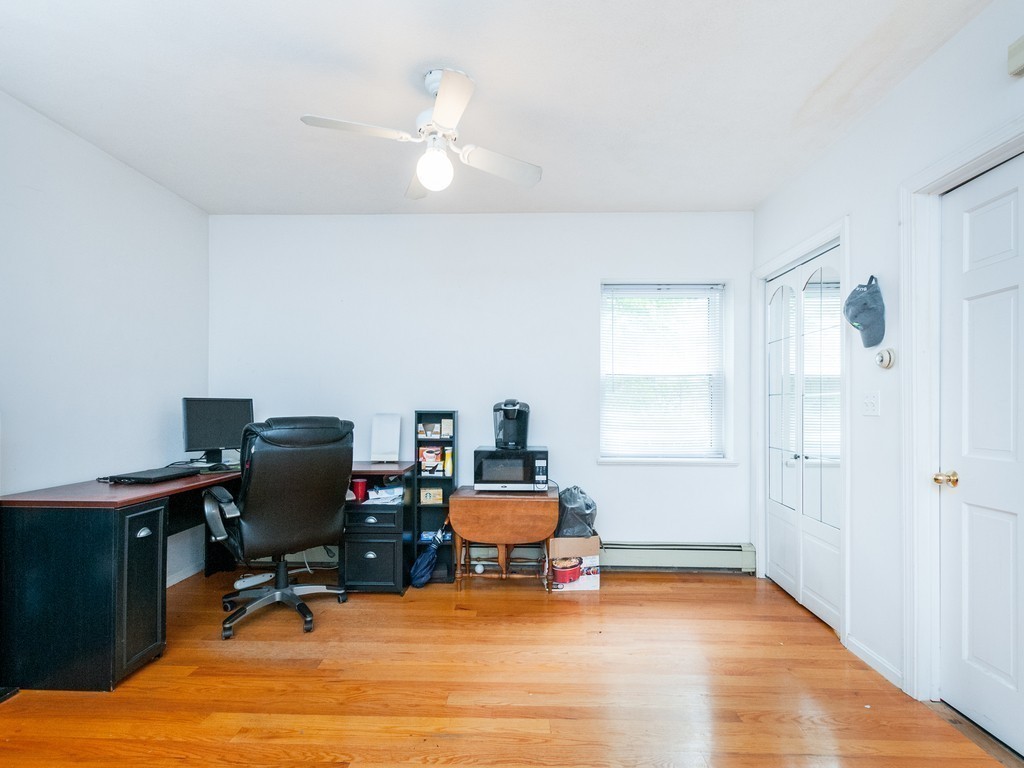 12 Regent Street Cambridge, MA 02140 - Photo 16 of 18 a room with a workspace