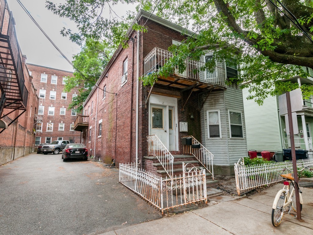 12 Regent Street Cambridge, MA 02140 - Photo 18 of 18 a view of a chair and table in the house front of house
