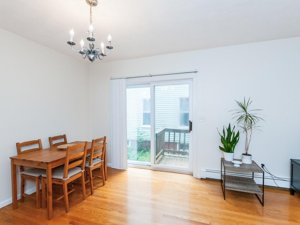 12 Regent Street Cambridge, MA 02140 - Photo 7 of 18 a view of a livingroom with furniture window and wooden floor