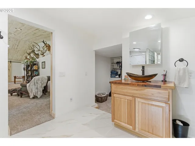 a bathroom with a bathtub and shower