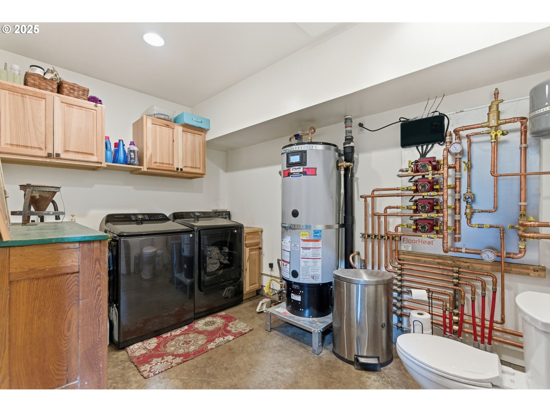 314 East Valley Road Skamokawa, WA 98647 - Photo 27 of 46 a kitchen with stainless steel appliances kitchen island granite countertop a refrigerator and a stove top oven
