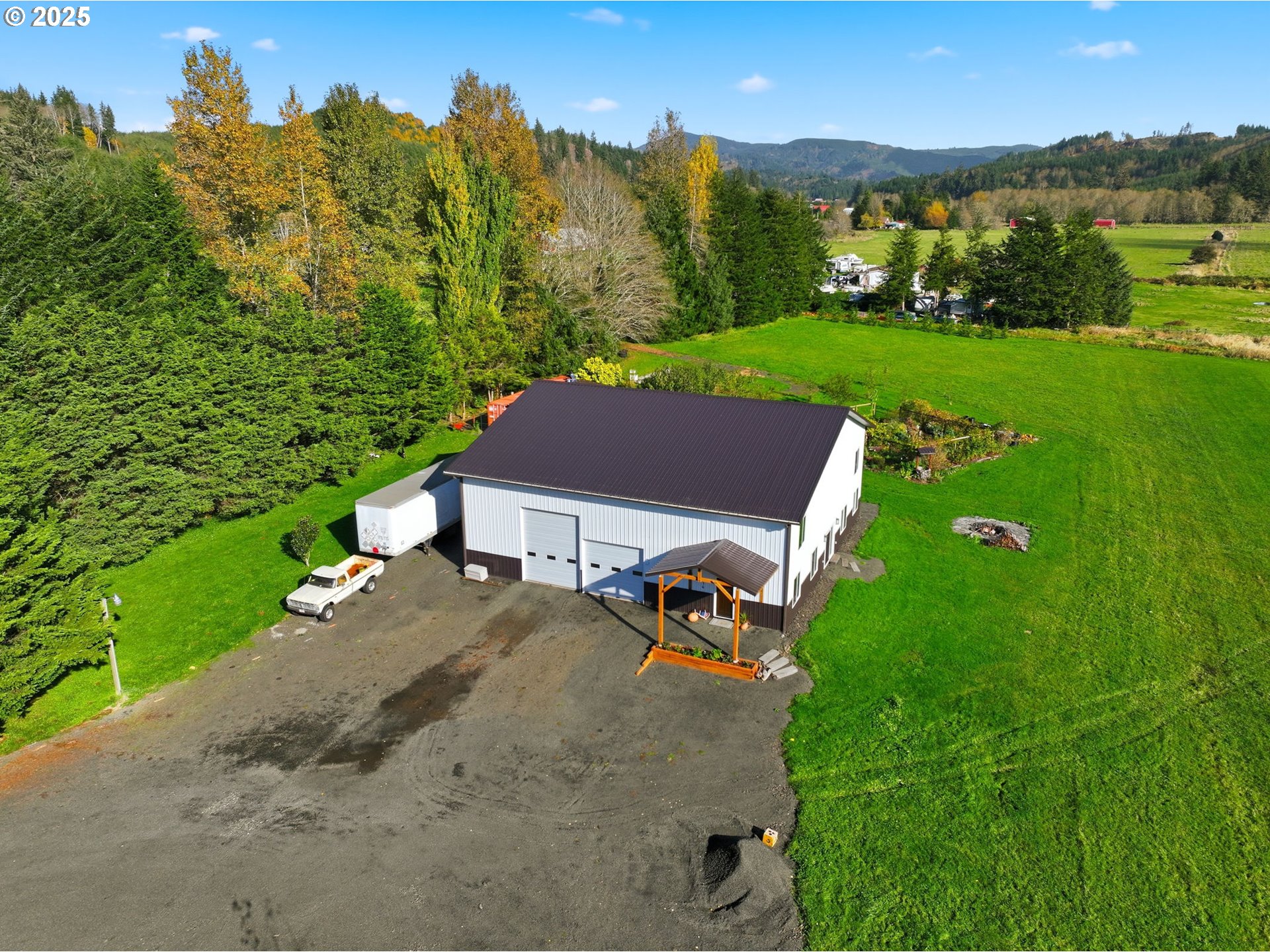 314 East Valley Road Skamokawa, WA 98647 - Photo 42 of 46 a view of a house with a yard