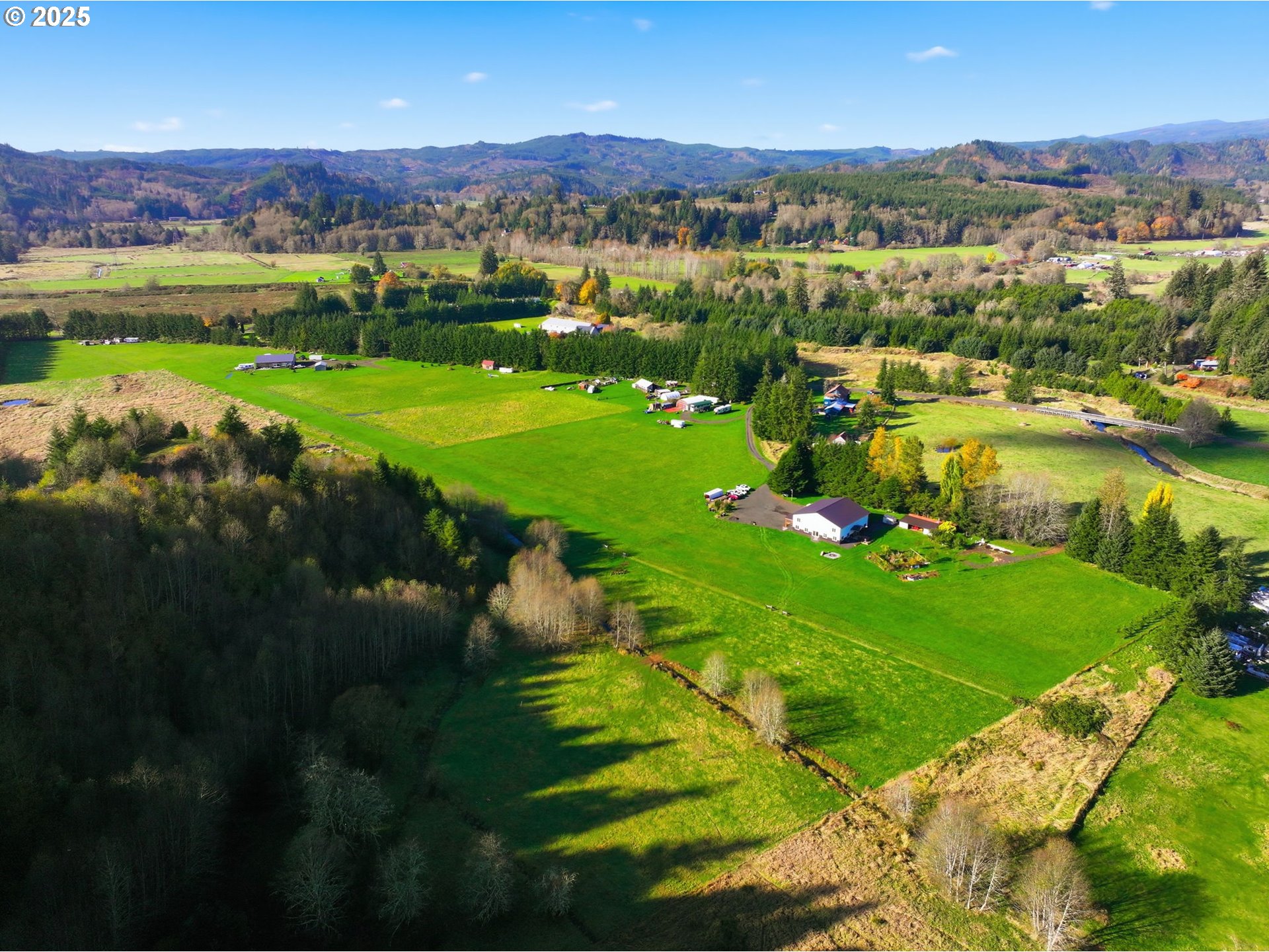 314 East Valley Road Skamokawa, WA 98647 - Photo 45 of 46 a view of a city with mountains in the background