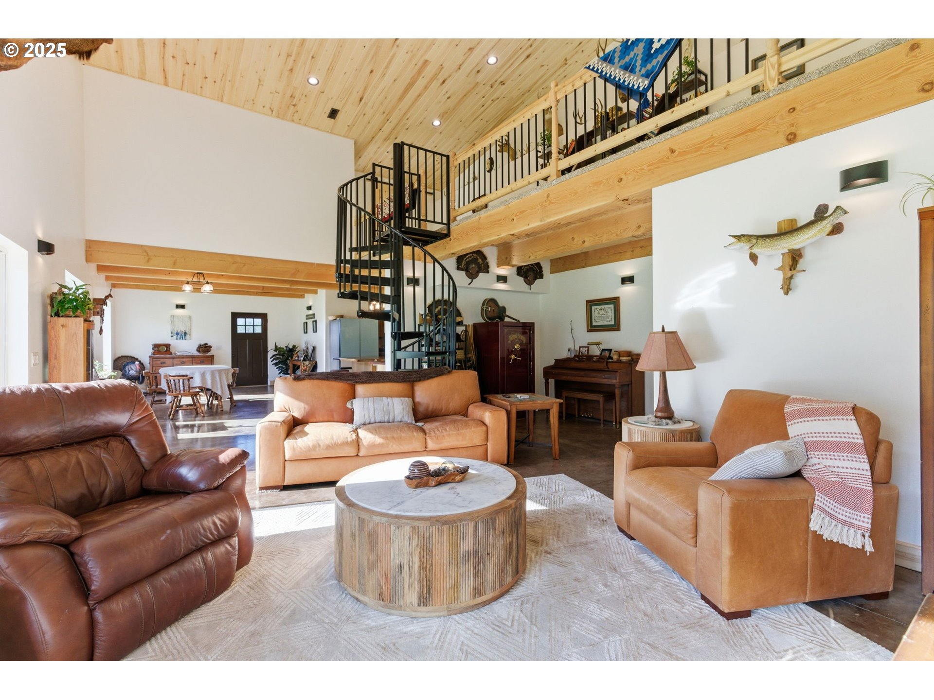 314 East Valley Road Skamokawa, WA 98647 - Photo 8 of 46 a living room with furniture and a large window