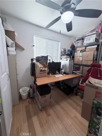a bedroom with a bed and dresser