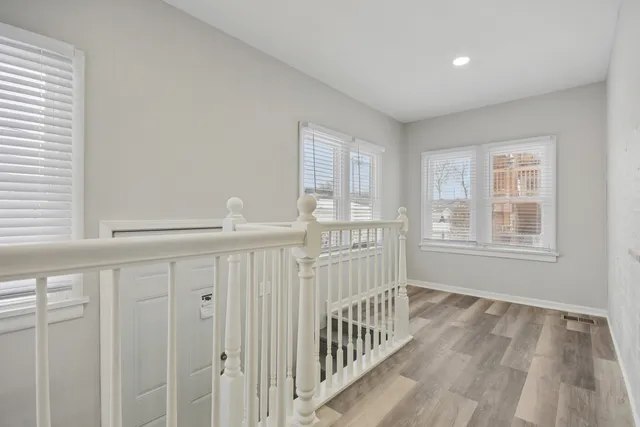 a view of a livingroom with wooden floor