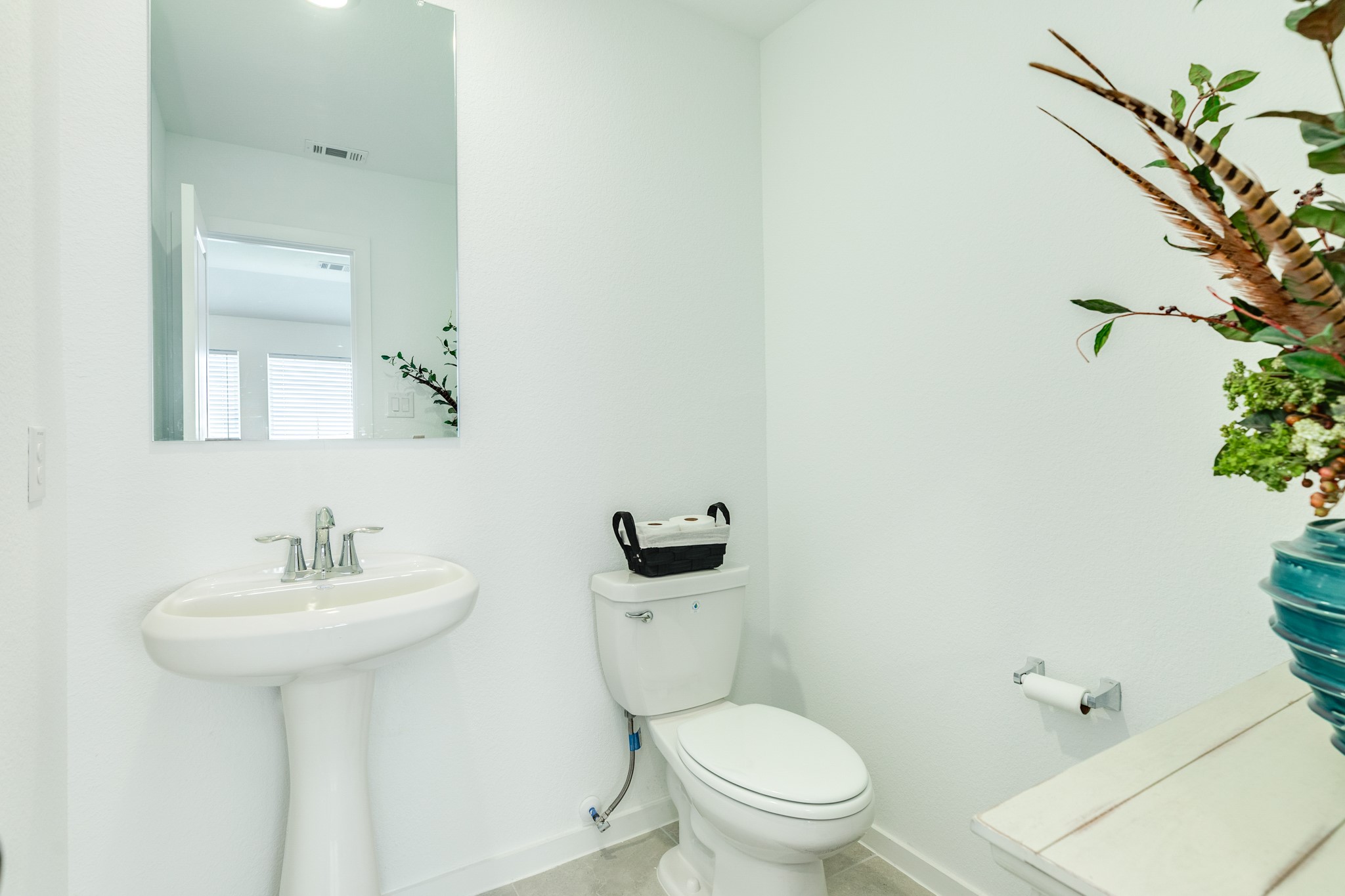 2618 Jasper Oaks Drive Rosharon, TX 77583 - Photo 32 of 43 a bathroom with a sink a toilet and mirror
