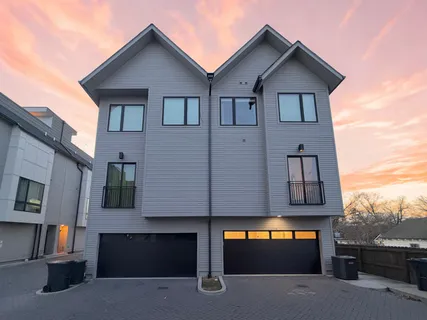 a view of front a house with garage