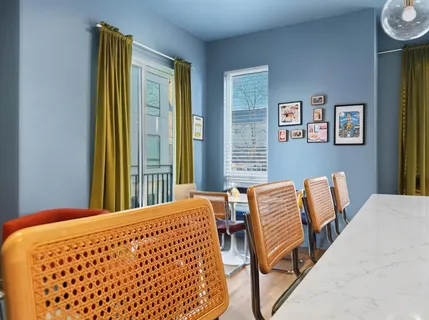 a bathroom with a toilet and a sink