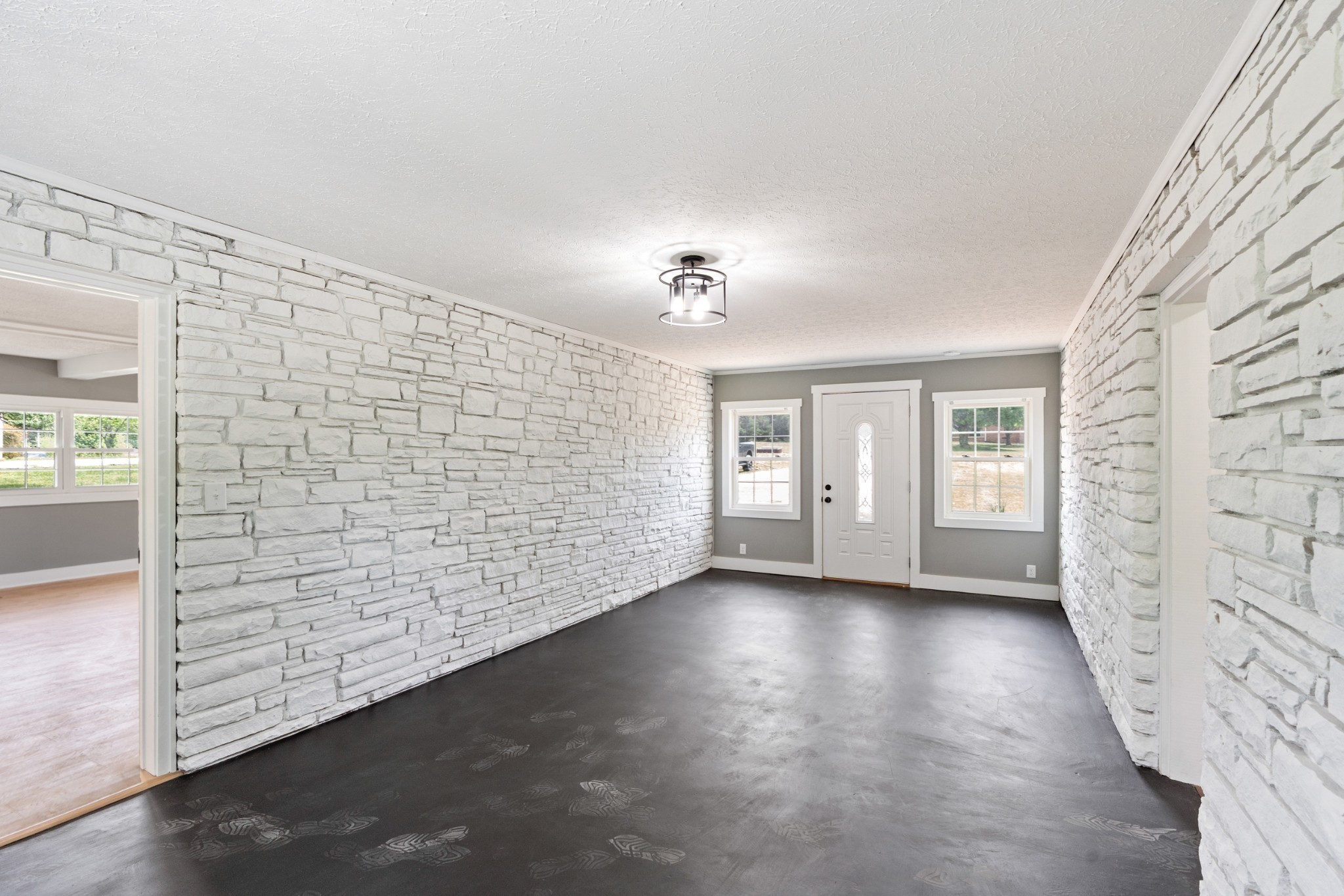 1503 5th Avenue West Springfield, TN 37172 - Photo 5 of 43 a view of an empty room with wooden floor and a window